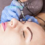 Cara Maitland Microblading a client to demonstrate making the shift from Microblading to Machine. 