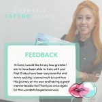 A smiling female student stands next to her positive feedback for Cosmetic Tattoo Clinic Manchester.