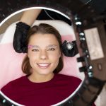 A young female live model going through Microblading treatment.
